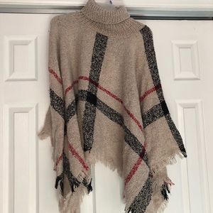 Poncho NEVER worn..